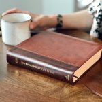Bible study journaling Bible journal on the table